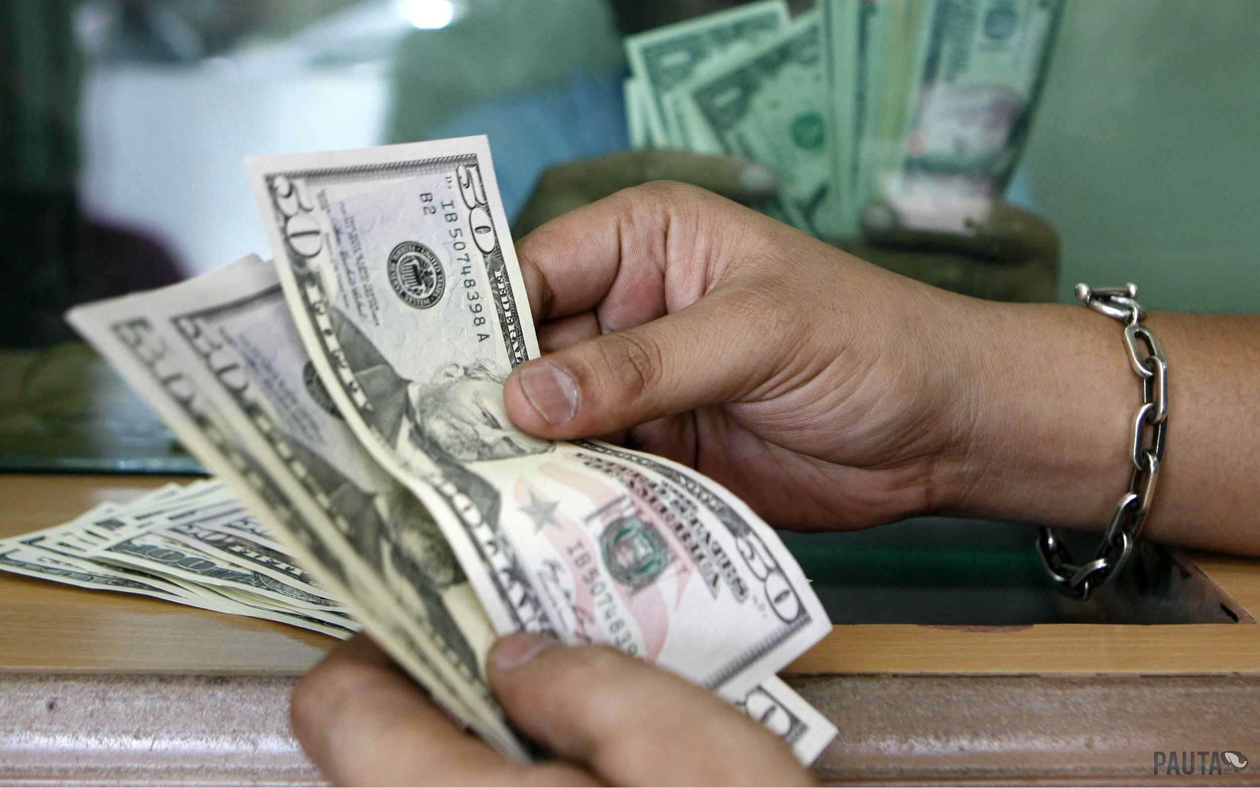 El dólar bajó 8 centavos y este miércoles se cambiaba a $59.70