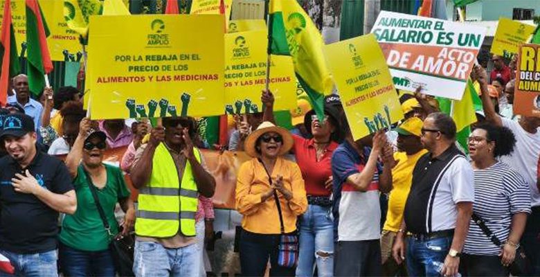 Denuncian Abinader y Magín Díaz castigan a los trabajadores al violar la Ley 11-92